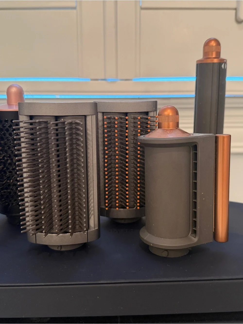 Dyson multi-attachment hair styler in charcoal and copper